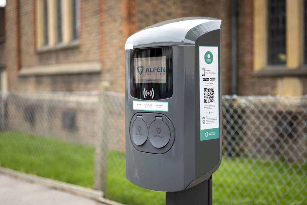 Charge point and a residential house in the background